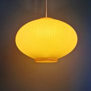Vintage oval-shaped suspension in pleated celluloid, light green colour, 1960.