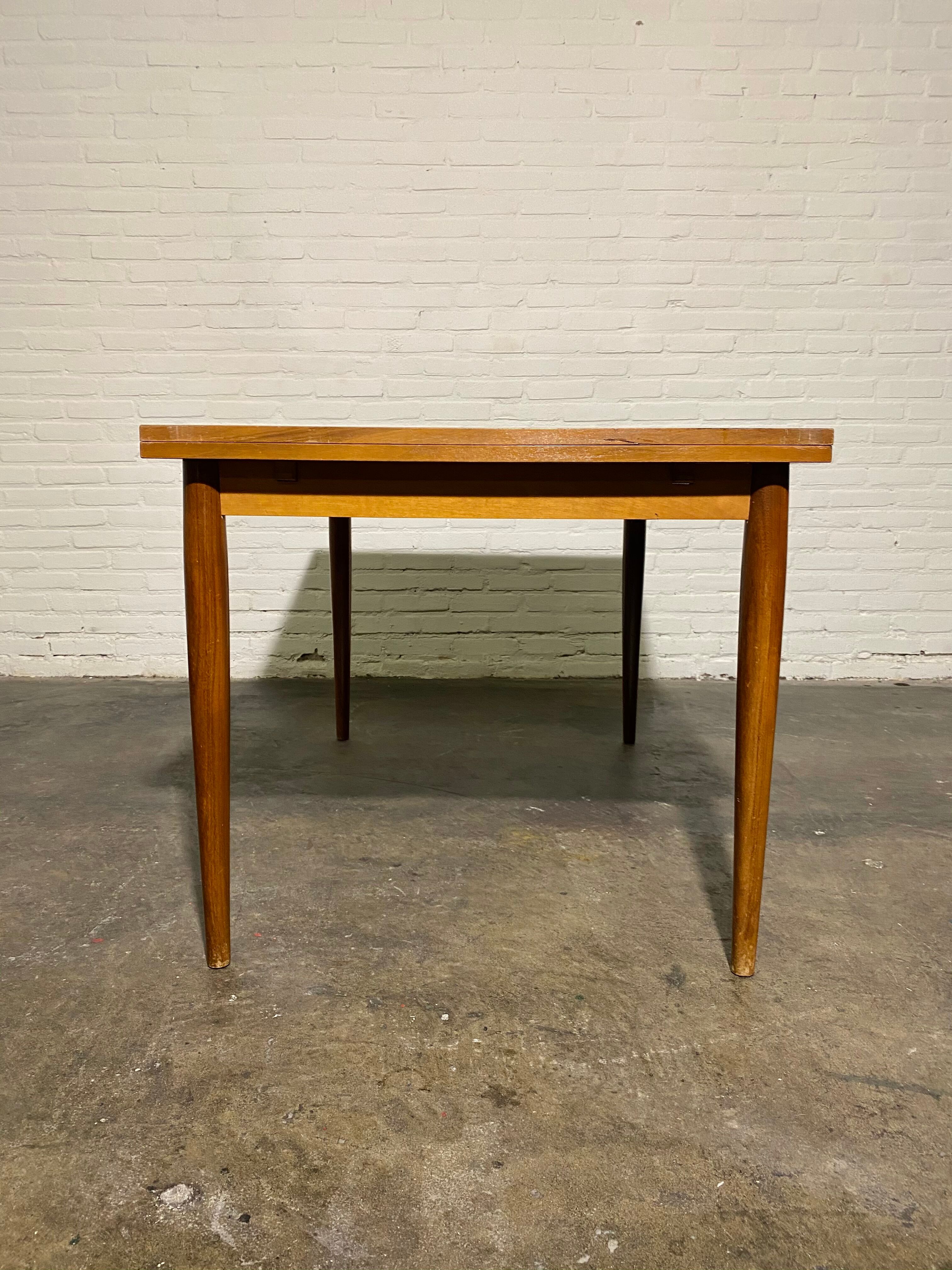 Vintage teak square extendable  dining table designed and manufactured by lübke,  1960s
