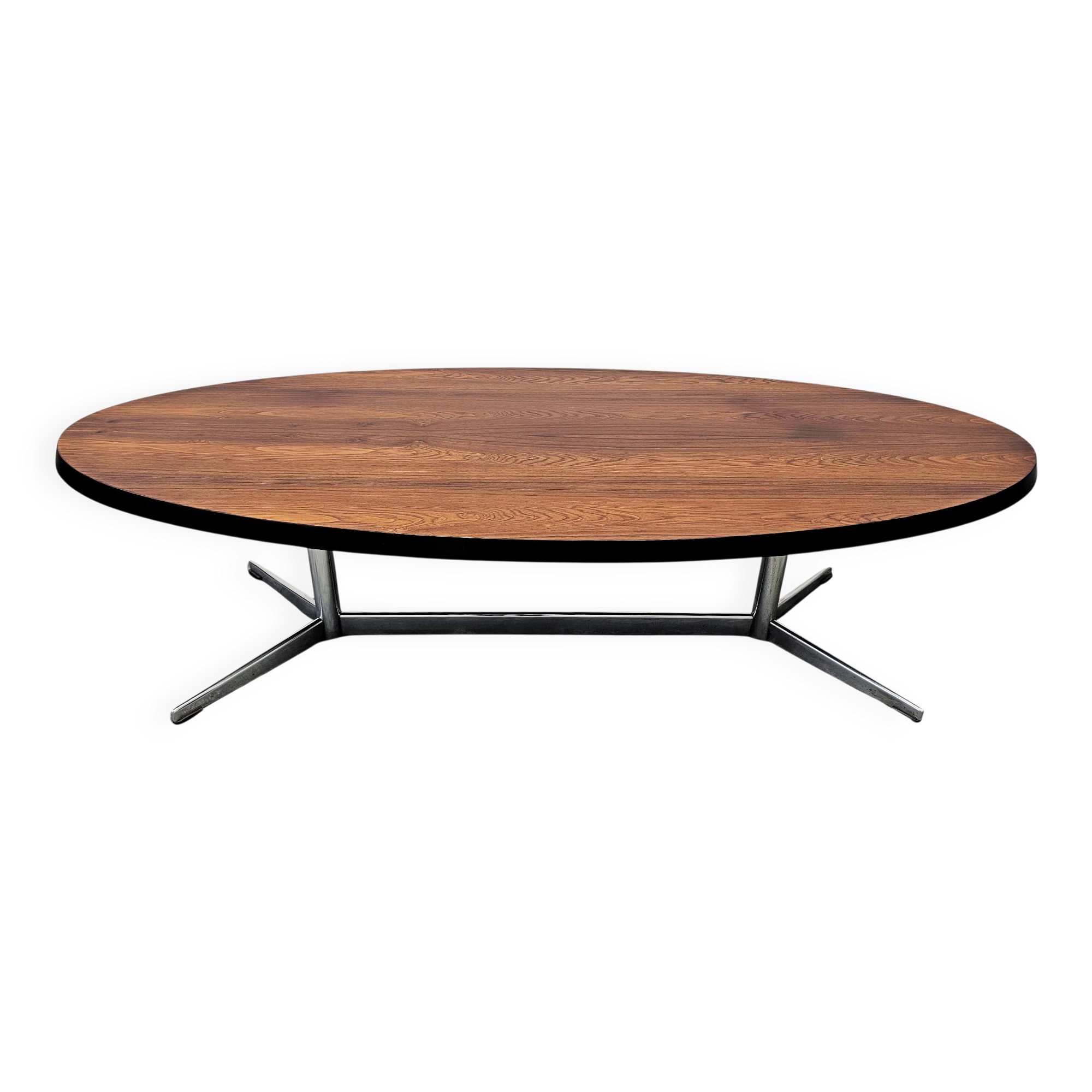 Danish Mid Century Modern oval coffee table with a teak top and chrome legs.