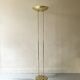 Modernist halogen floor lamp with a gold bowl, 1980.