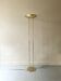Modernist halogen floor lamp with a gold bowl, 1980.