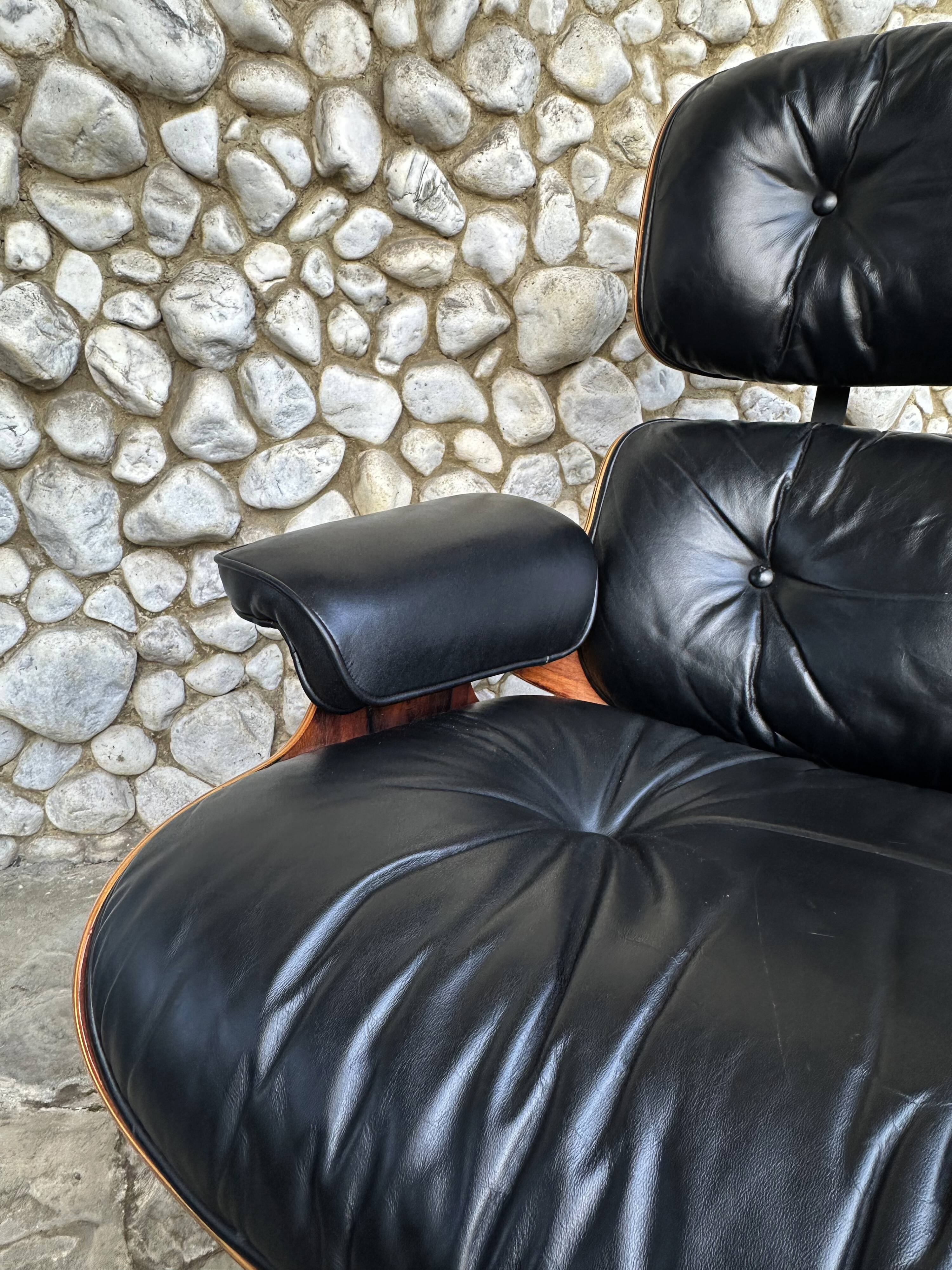 Fauteuil Lounge et ottoman Herman Miller Charles & Ray Eames, palissandre