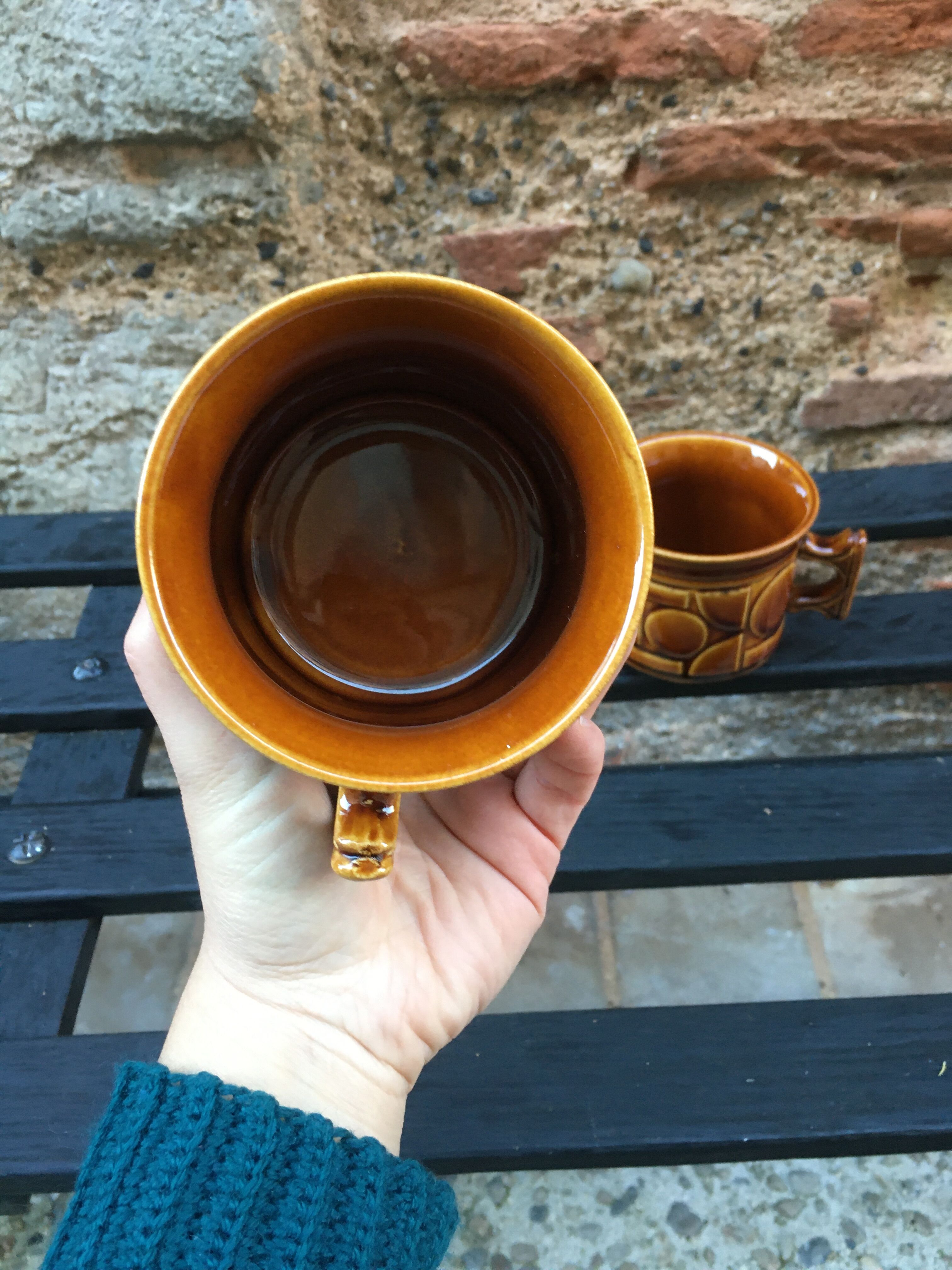 Two brown coffee cups