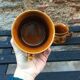 Two brown coffee cups