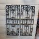 Ancienne paire de grilles en fer forgé