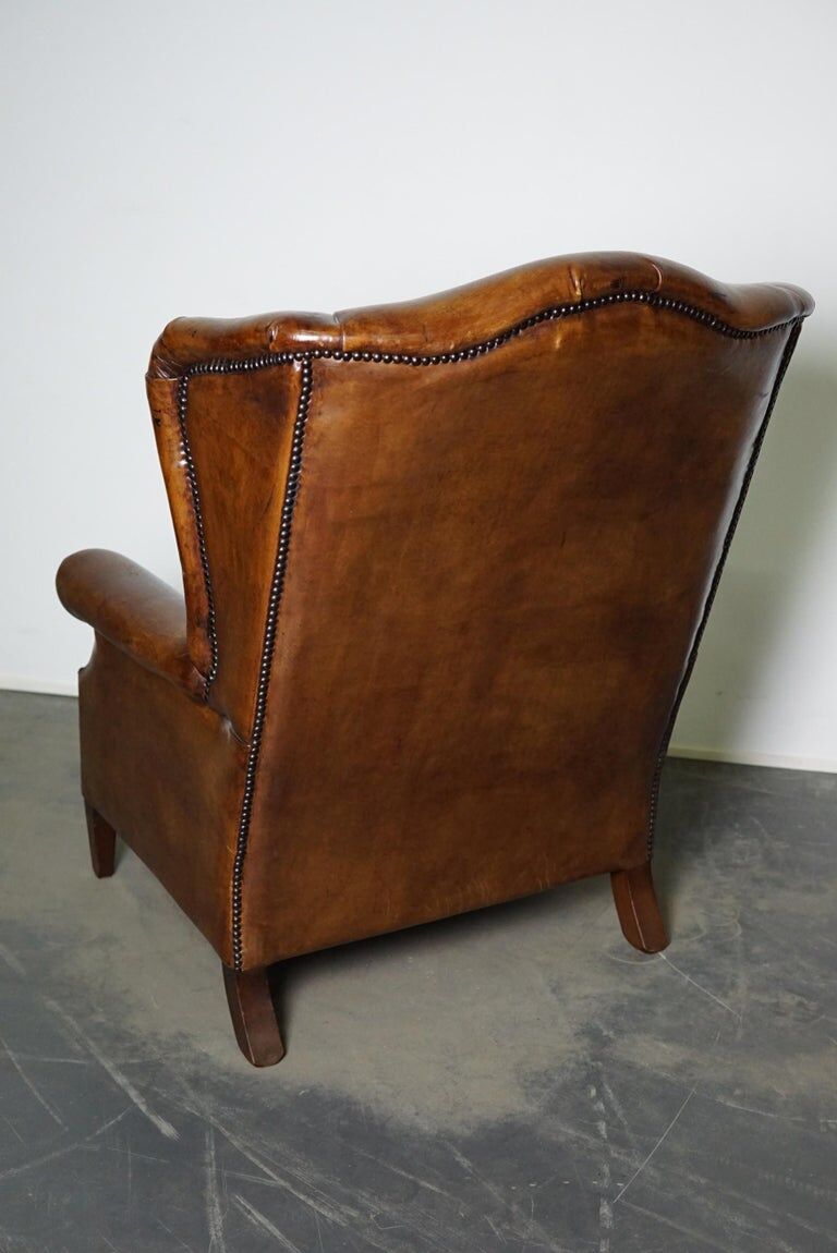 Fauteuil club vintage en cuir de couleur cognac Pays-Bas