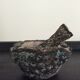 Old mortar and its ceramic pestle Fat Lava