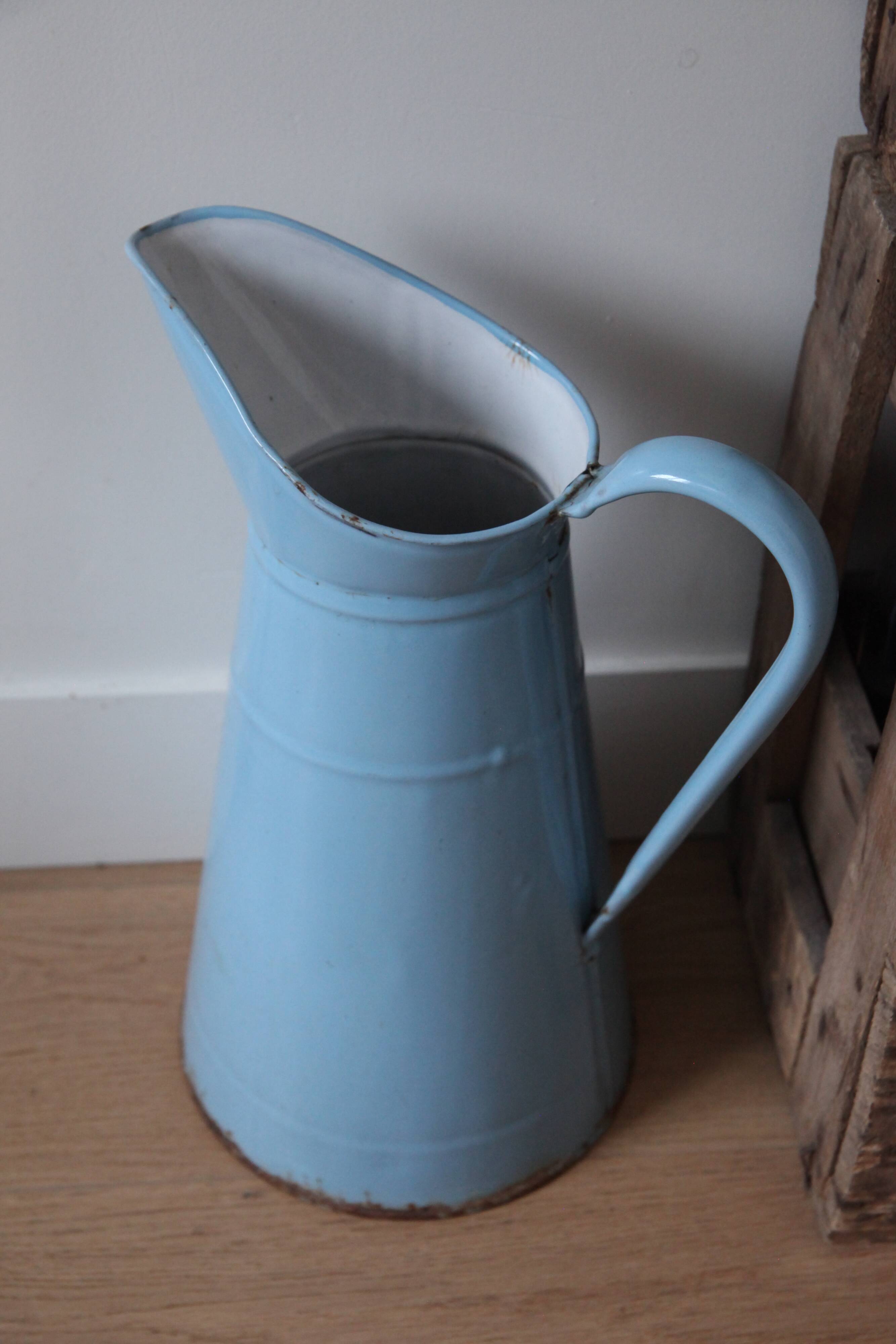 Enamelled metal jug