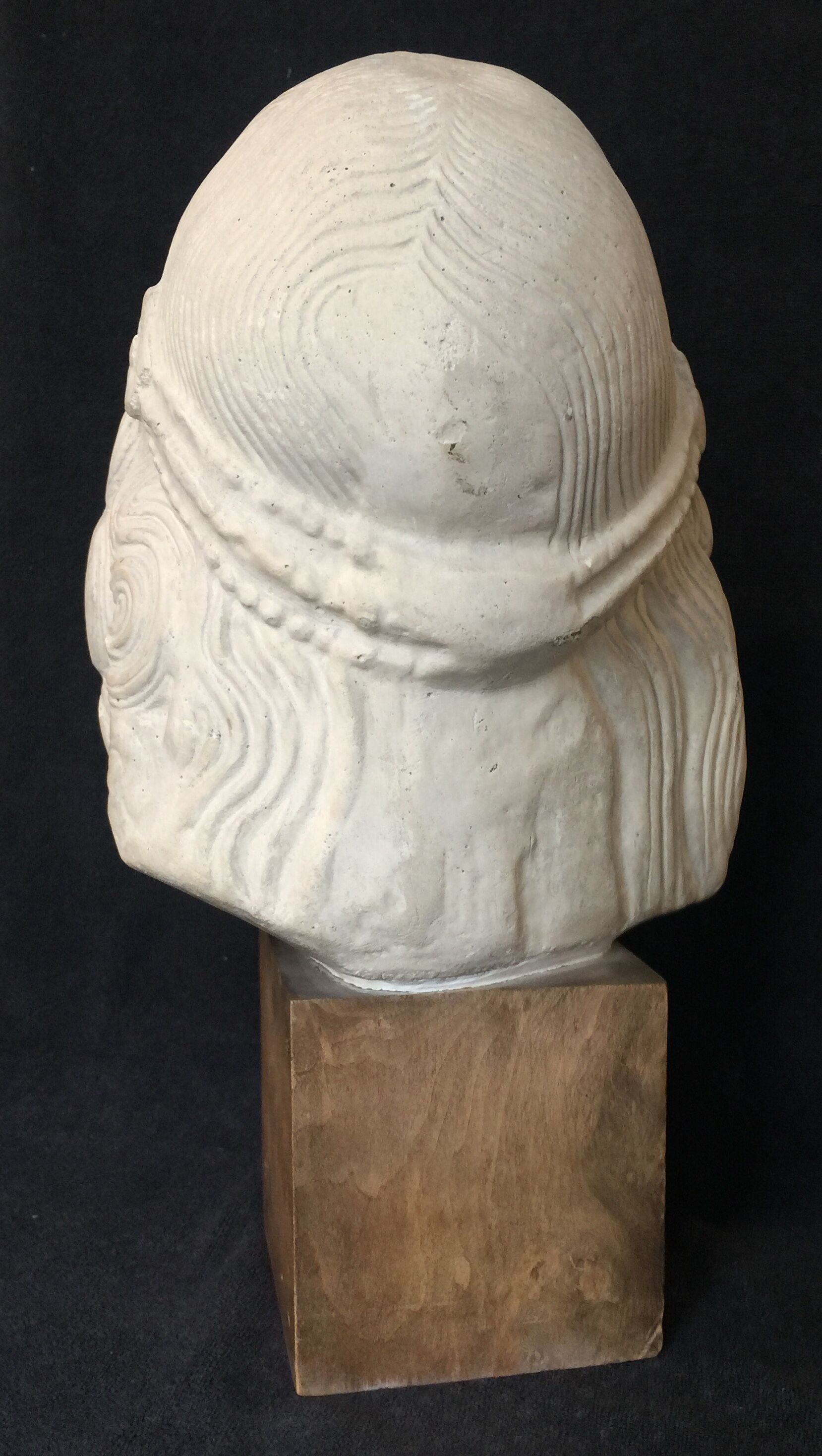 Bronze-middle-aged woman's head in plaster