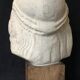 Bronze-middle-aged woman's head in plaster