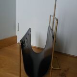 Modernist magazine rack in the style of Jacques Adnet