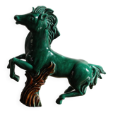 Cheval en faïence verte