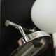 Pair of sconces with an opaline globe and chrome structure from the 1970s