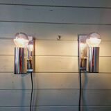 Pair of tubular wall sconces in chrome metal, 1970.