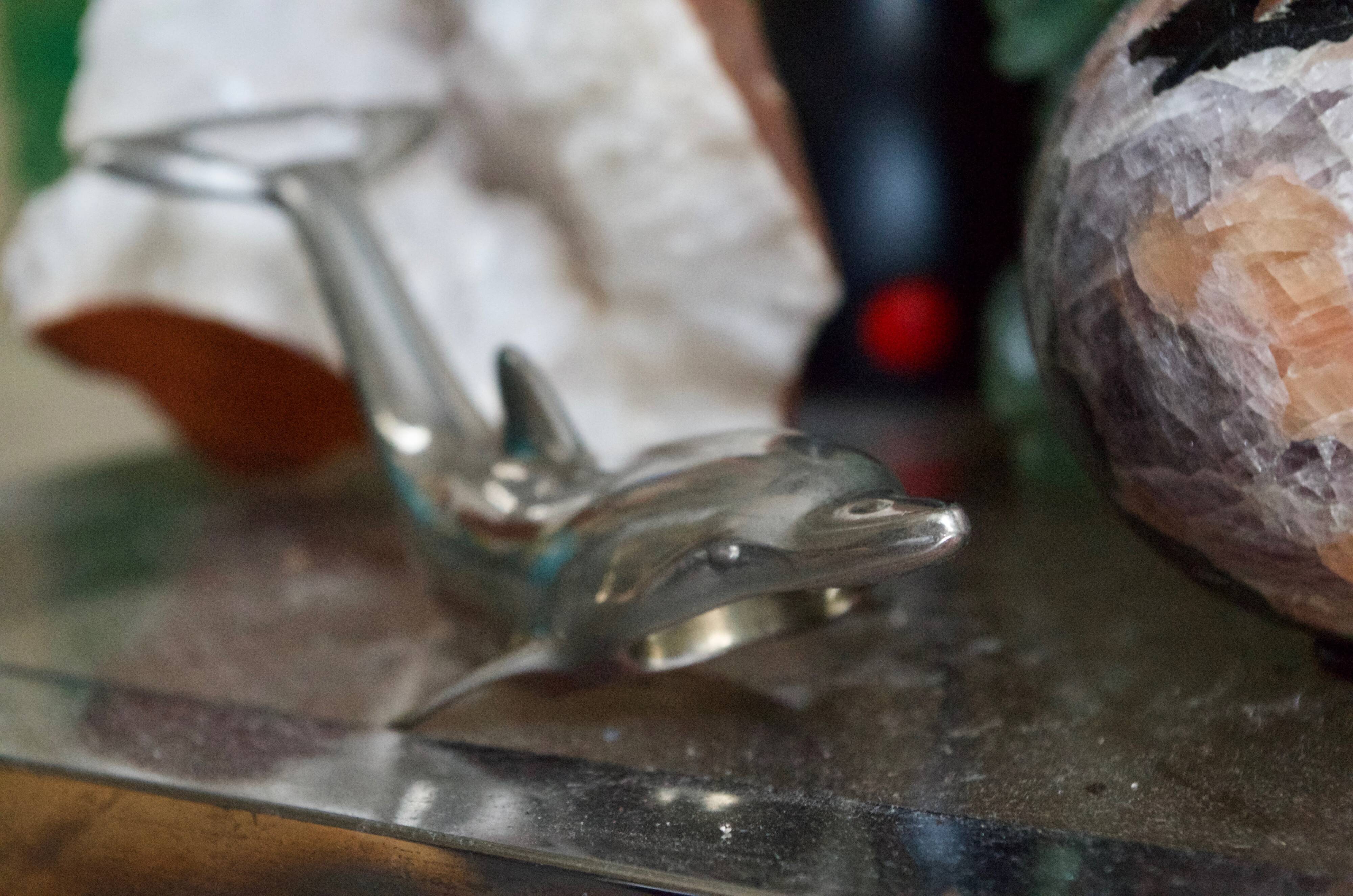Vintage metal bottle opener dolphin