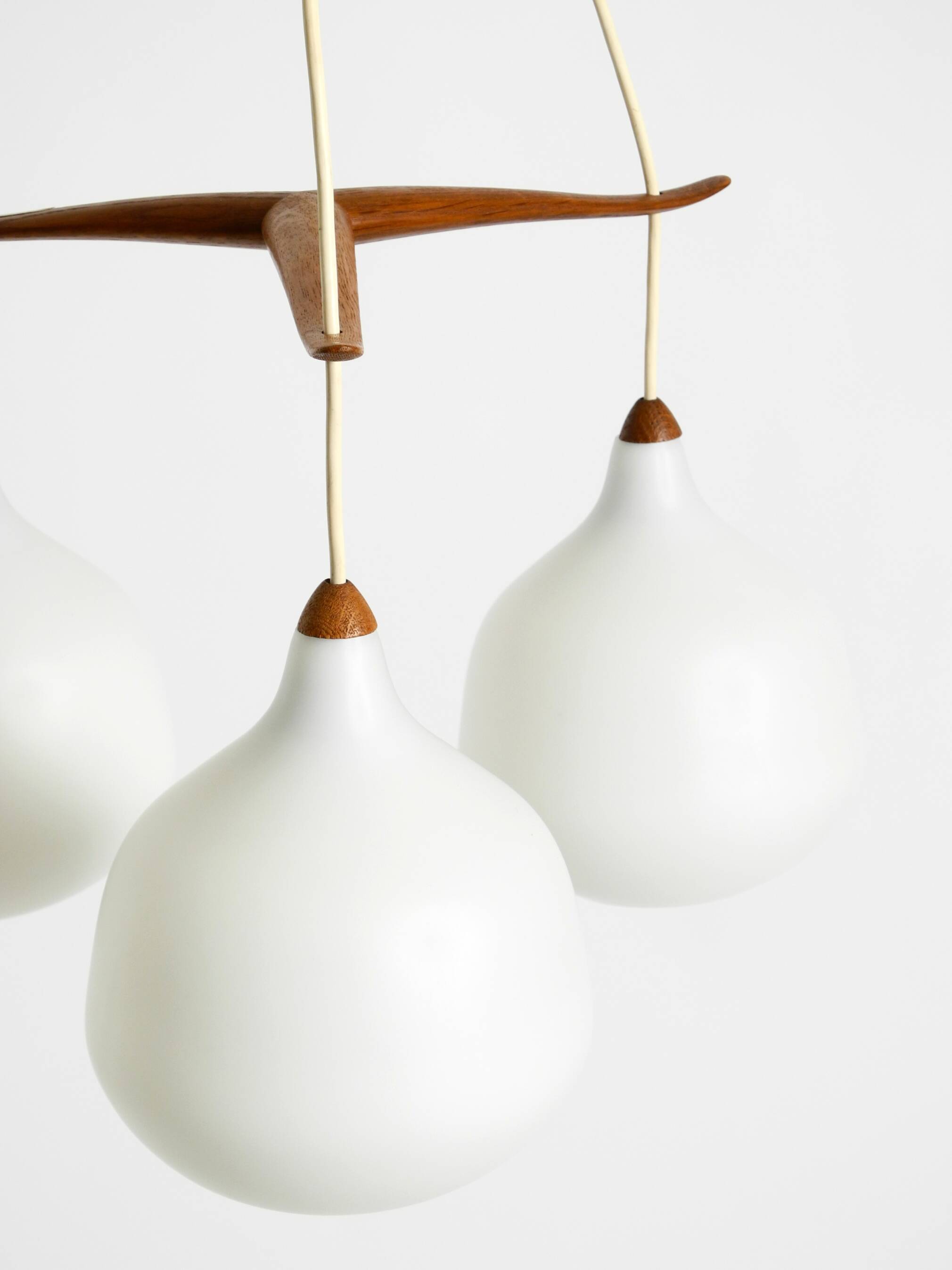 Pendant lamp with opal glass shades teak frame by Uno & Östen Kristiansson