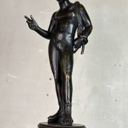 Narcissus, bronze after the antique on a wooden base, circa 1880.