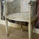 Fauteuil de bureau de style Louis XVI en bois laqué, cannage et tissu