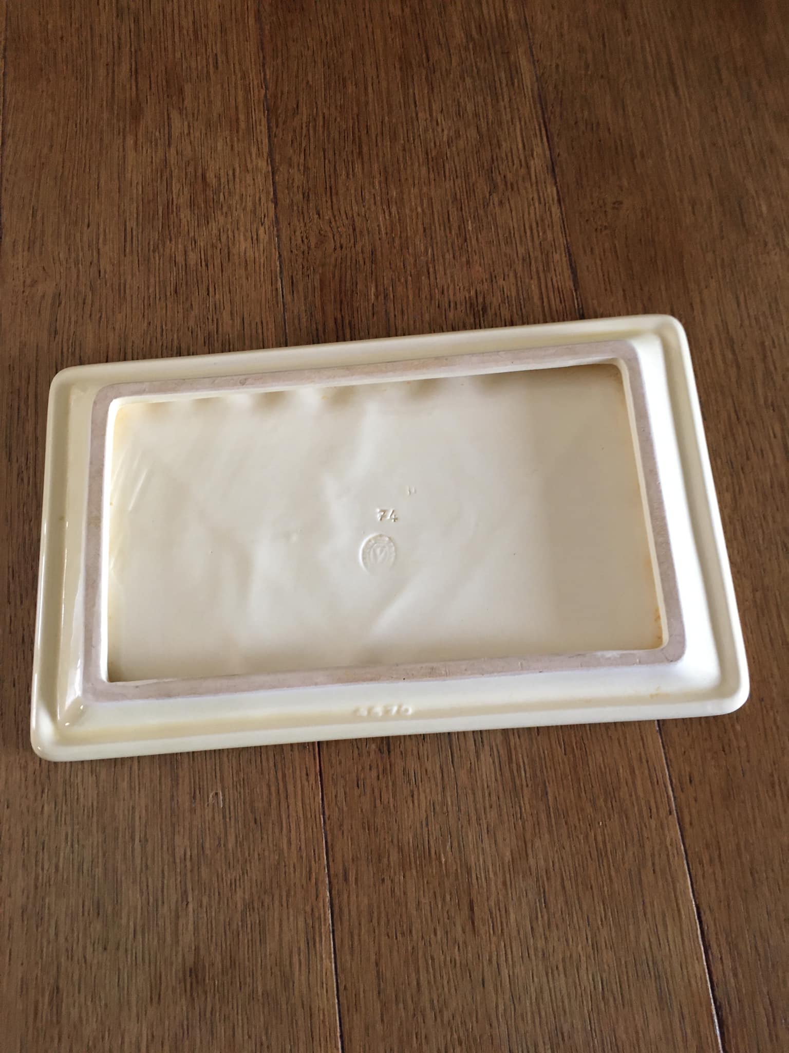 Antique rectangular ceramic trivia with inlaid leaves