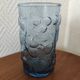 Blue glass with fruit relief decoration