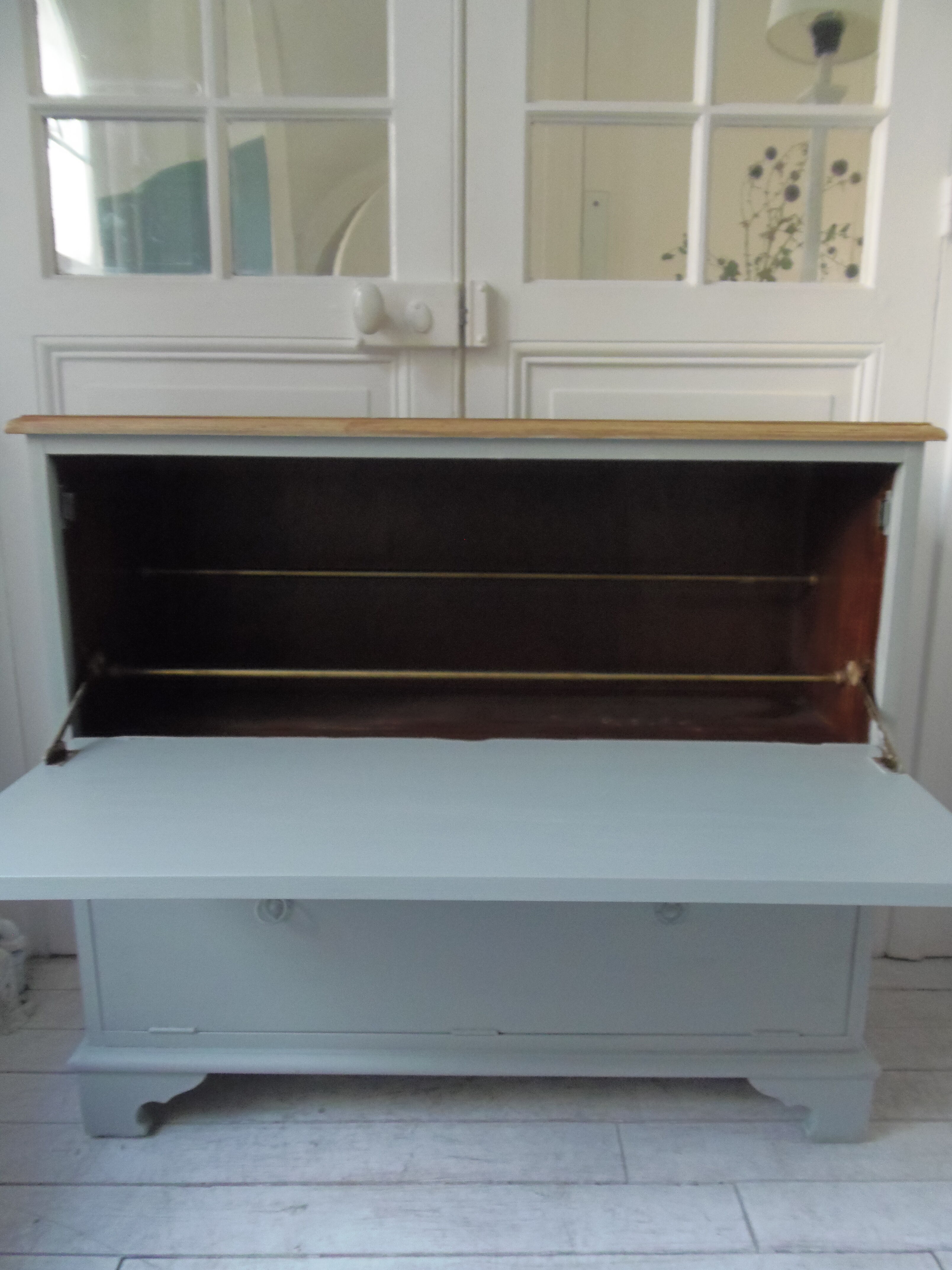 Vintage shoe cabinet green of gray, wooden top.