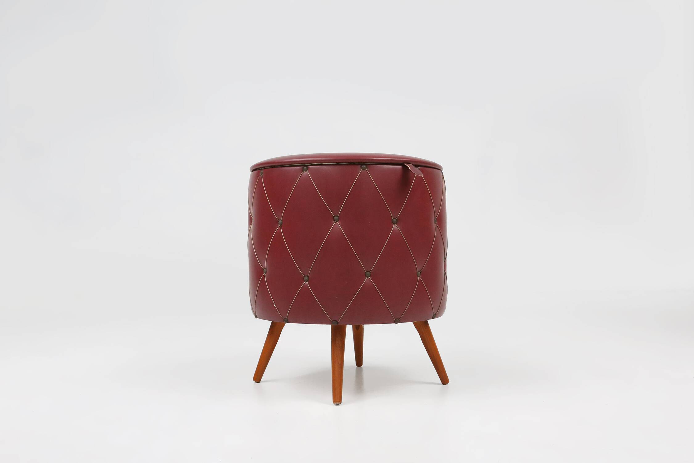 Vintage pouf with storage in dark red faux leather, France ca. 1950