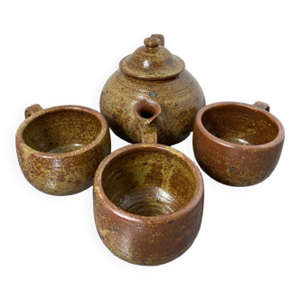 Old stoneware teapot and bowls