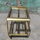 Old rolling coffee table serving vintage brass bar 50s mid-century design