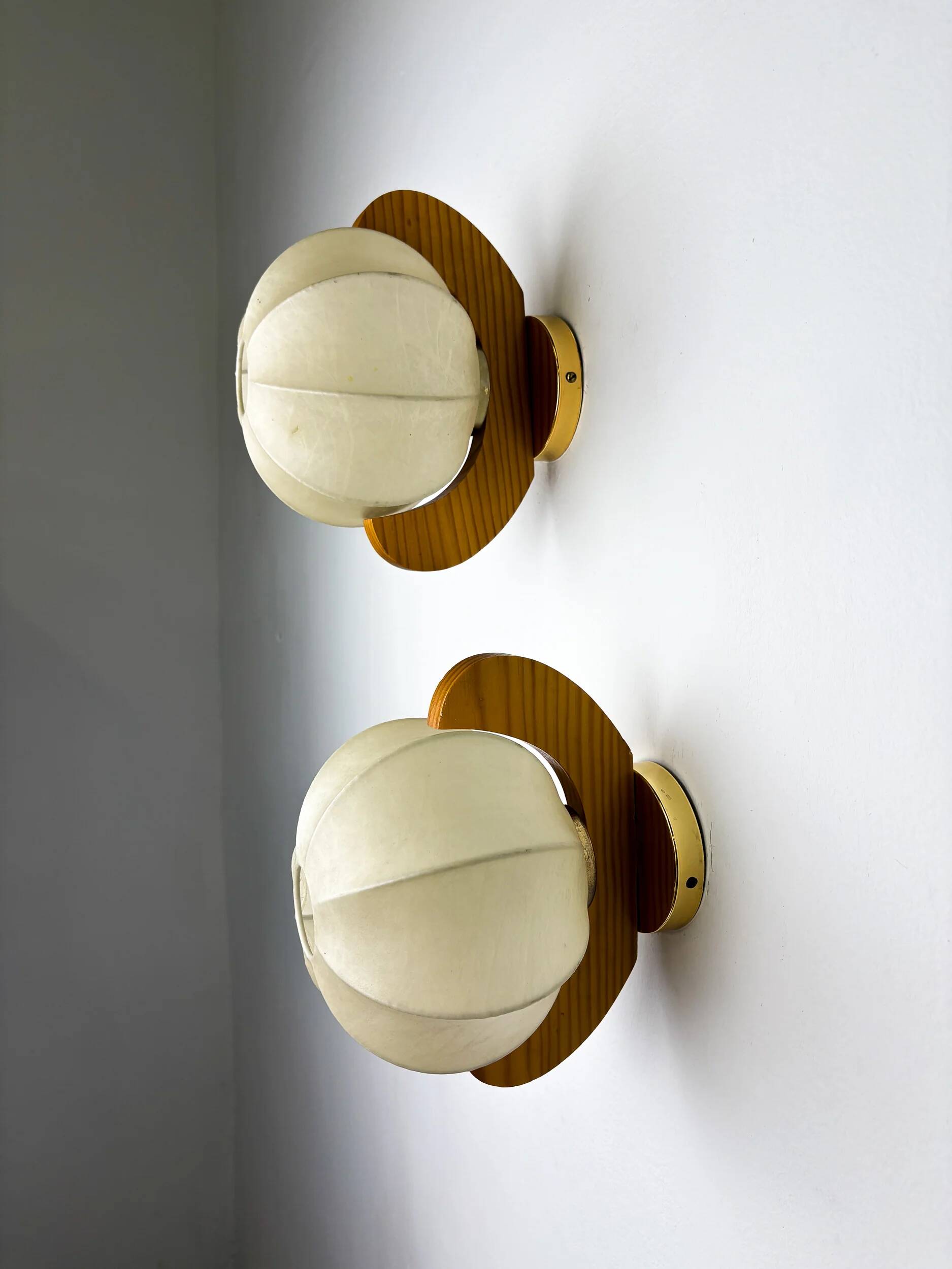 Pair of cocoon sconces with pine, Italy, 1970