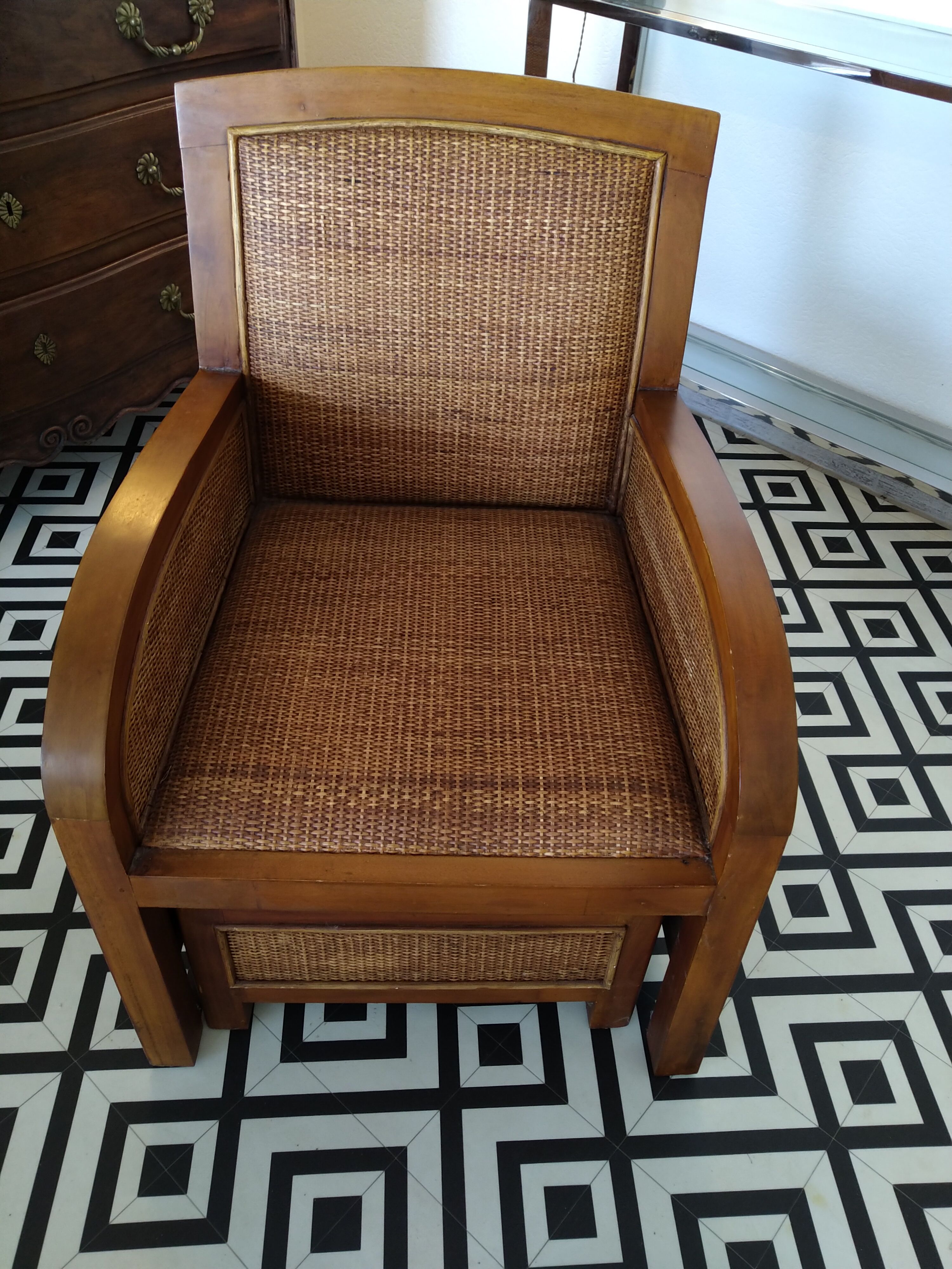 Colonial rattan armchair with ottoman