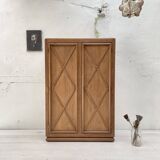 Storage unit in solid oak and veneer, circa 1960.