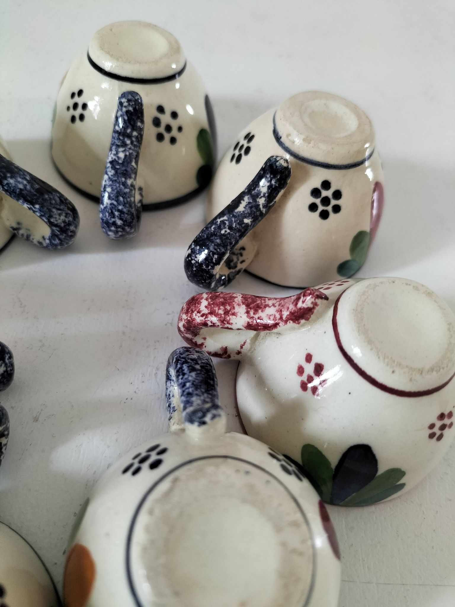 Set of 7 miniature Quimper earthenware cups
