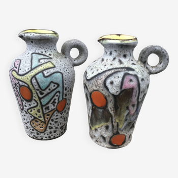Pair of Marius Bessone vases, pitchers