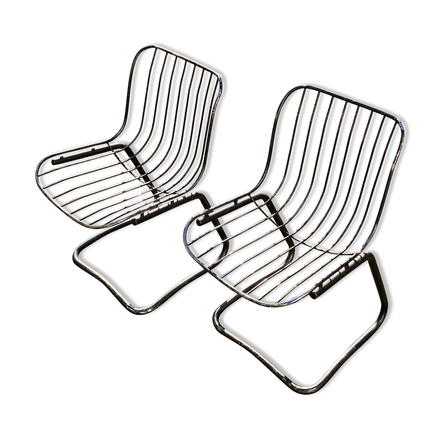 Two chairs in chrome metal