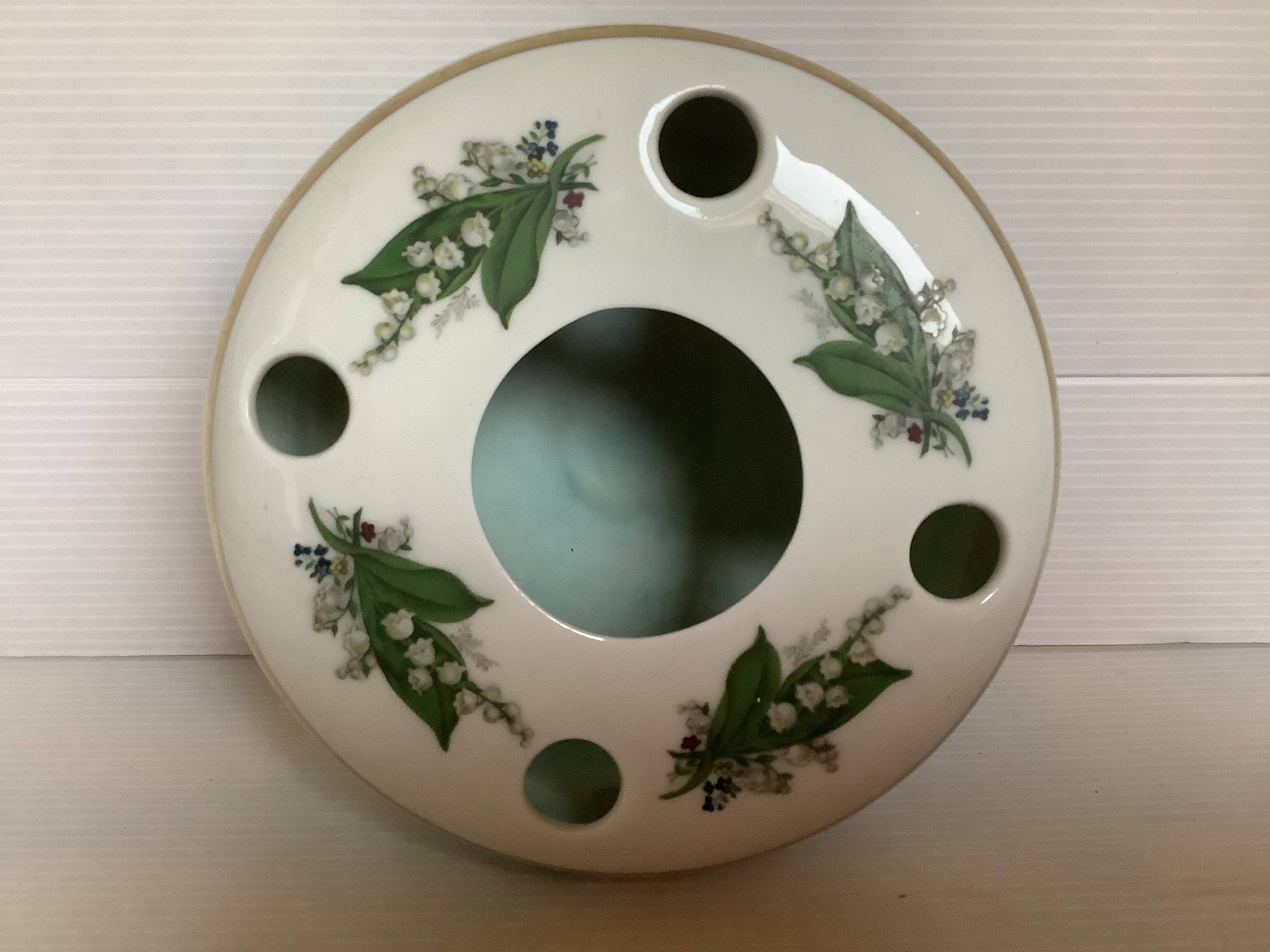 Vase with lily of the valley flowers bavaria