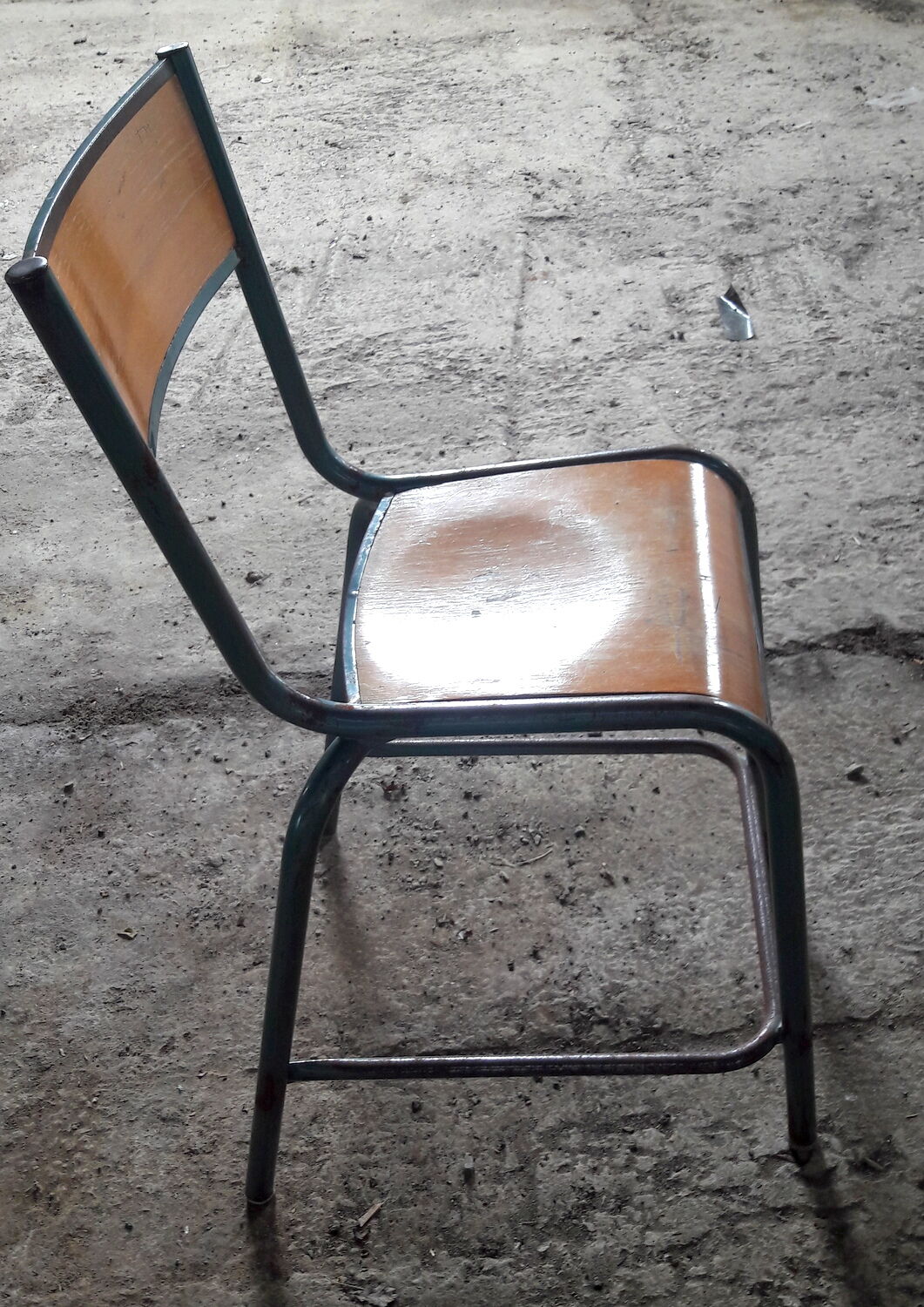 Old science school chair in tube