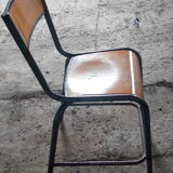 Old science school chair in tube