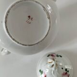 Porcelain teapot with rose patterns