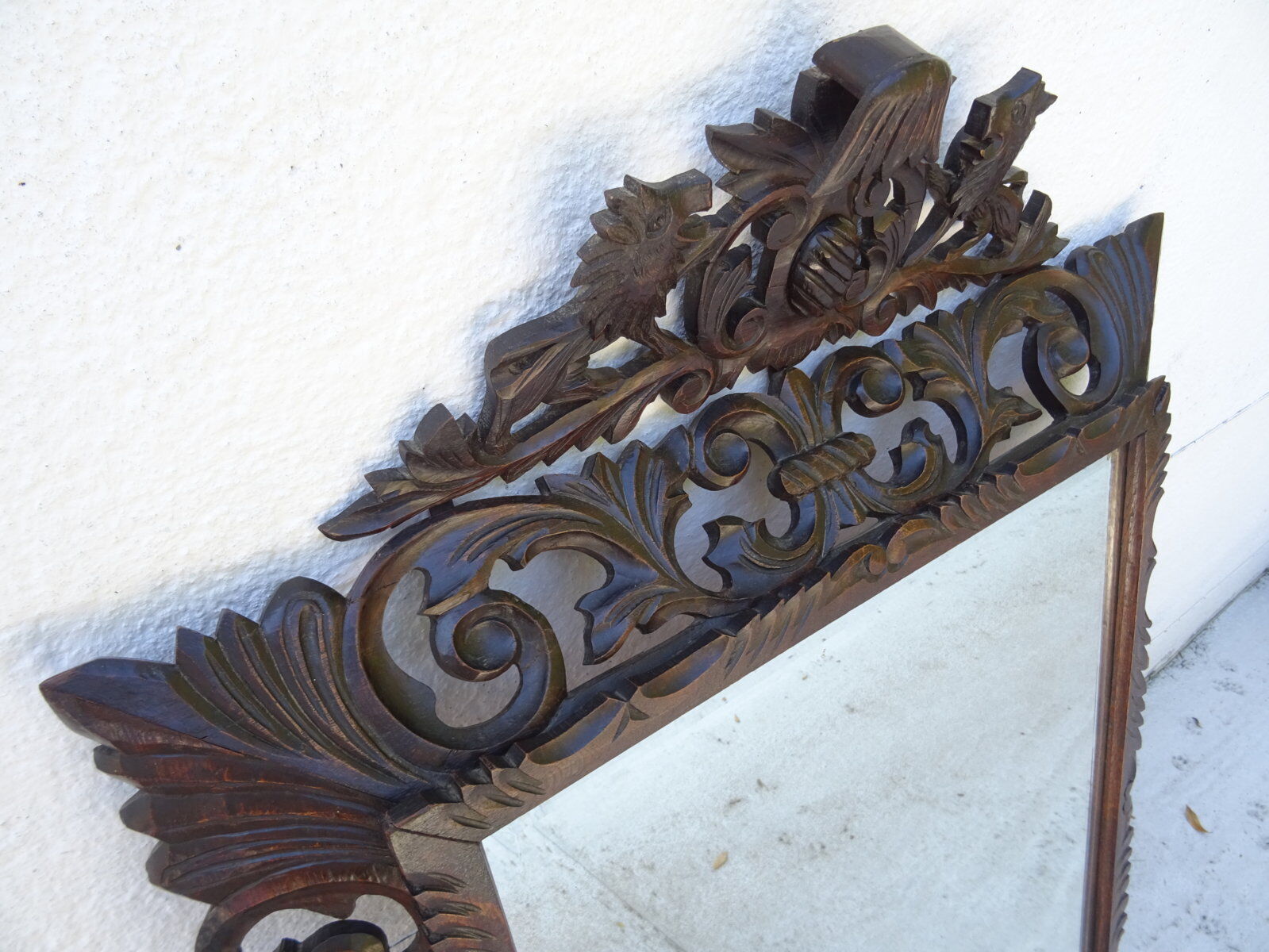 Miroir sculpté fronton lions