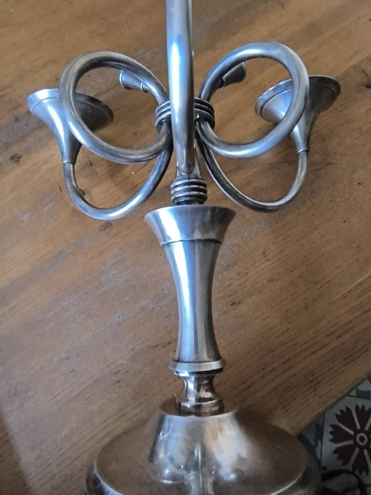 Ercuis pair of candlesticks model Cheverny in silver-plated metal with hunting horn decoration.