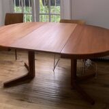 Round teak table with central leg and extension. Denmark 1960