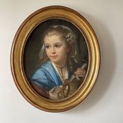 Portrait of a young girl in pastel from the 19th century.