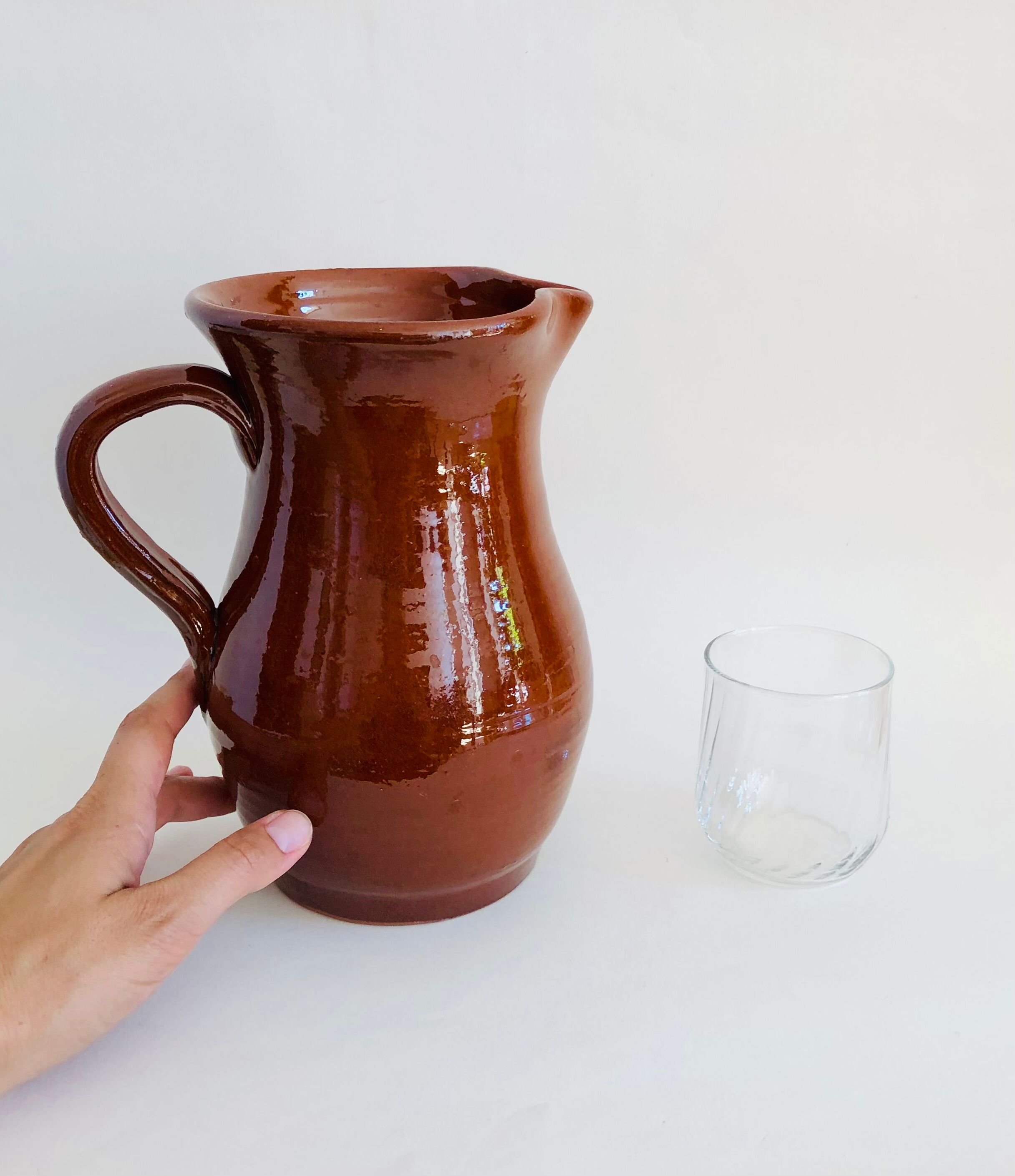 Vintage pitcher in glazed earth