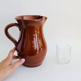 Vintage pitcher in glazed earth