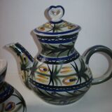 Service has chocolate Quimper Keraluc two cups