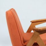 Fauteuil scandinave orange brûlée conclu par Chierowski