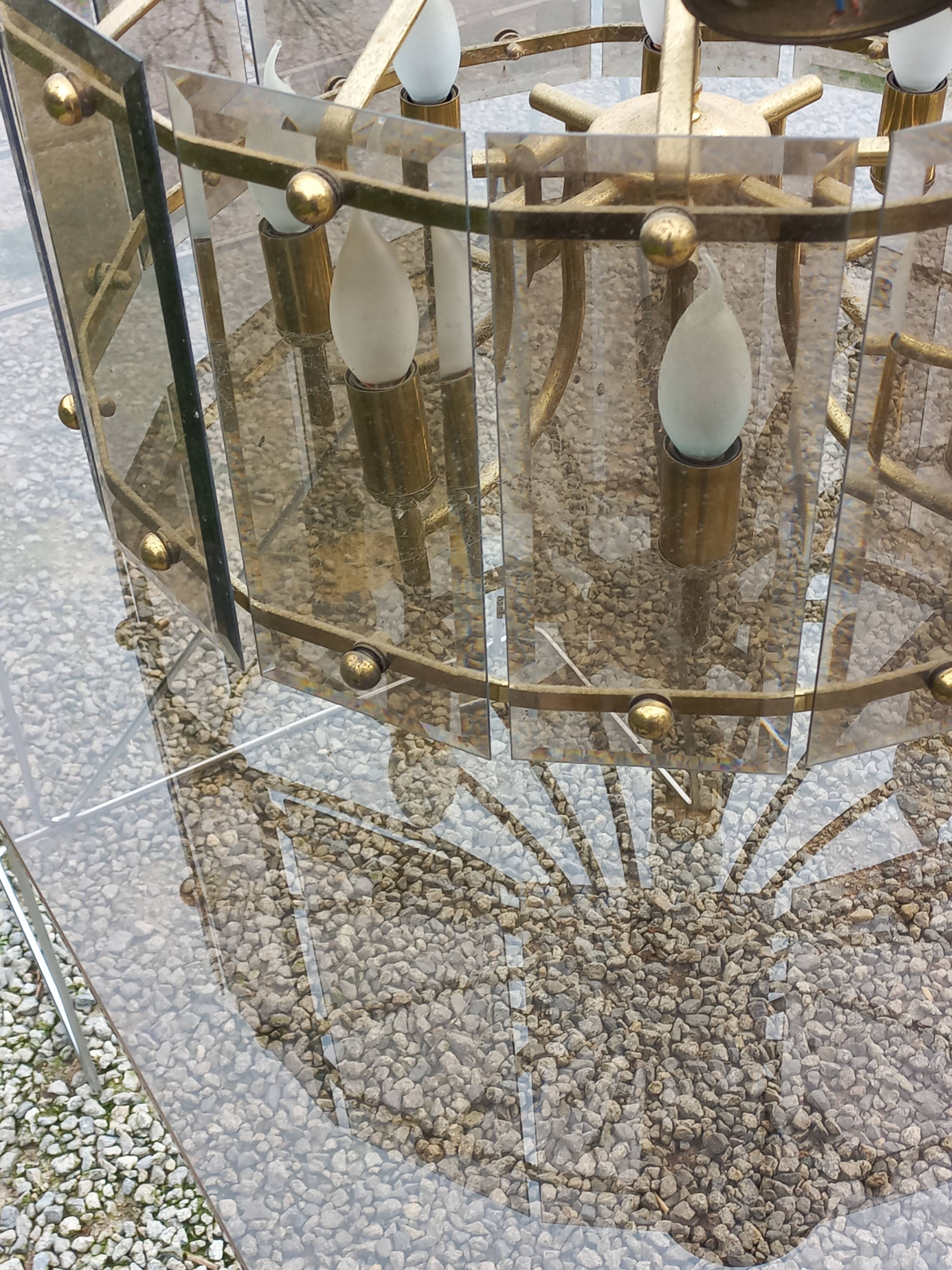 70s designer chandelier with smoked glass plates and gold metal frame