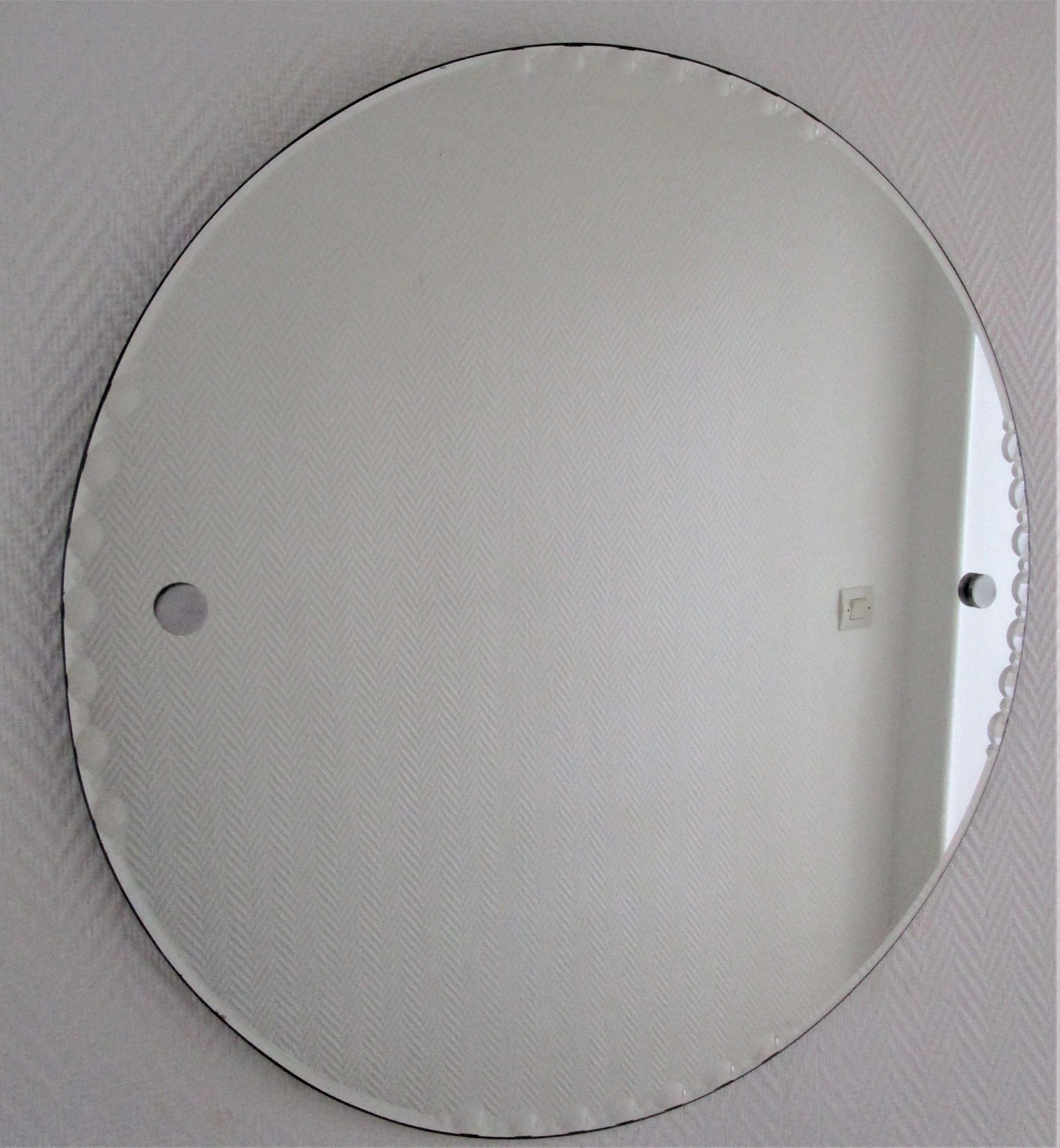Round mirror with bevelled rim of the 60s diameter 66 cm