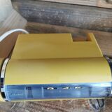 Yellow vintage sankyo alarm clock