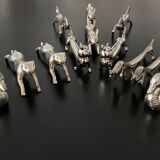 12 knife holders form various metal animals